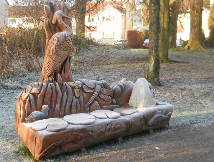 Carved Beech Log Bench at Kilmardinny Loch in Bearsden