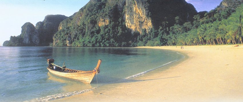 Beach and Limestone Cliffs at Hat Rai Leh ( West ) at Phra Nang near Krabi in Southern Thailand